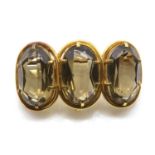 A Victorian three stone Cairngorm brooch,