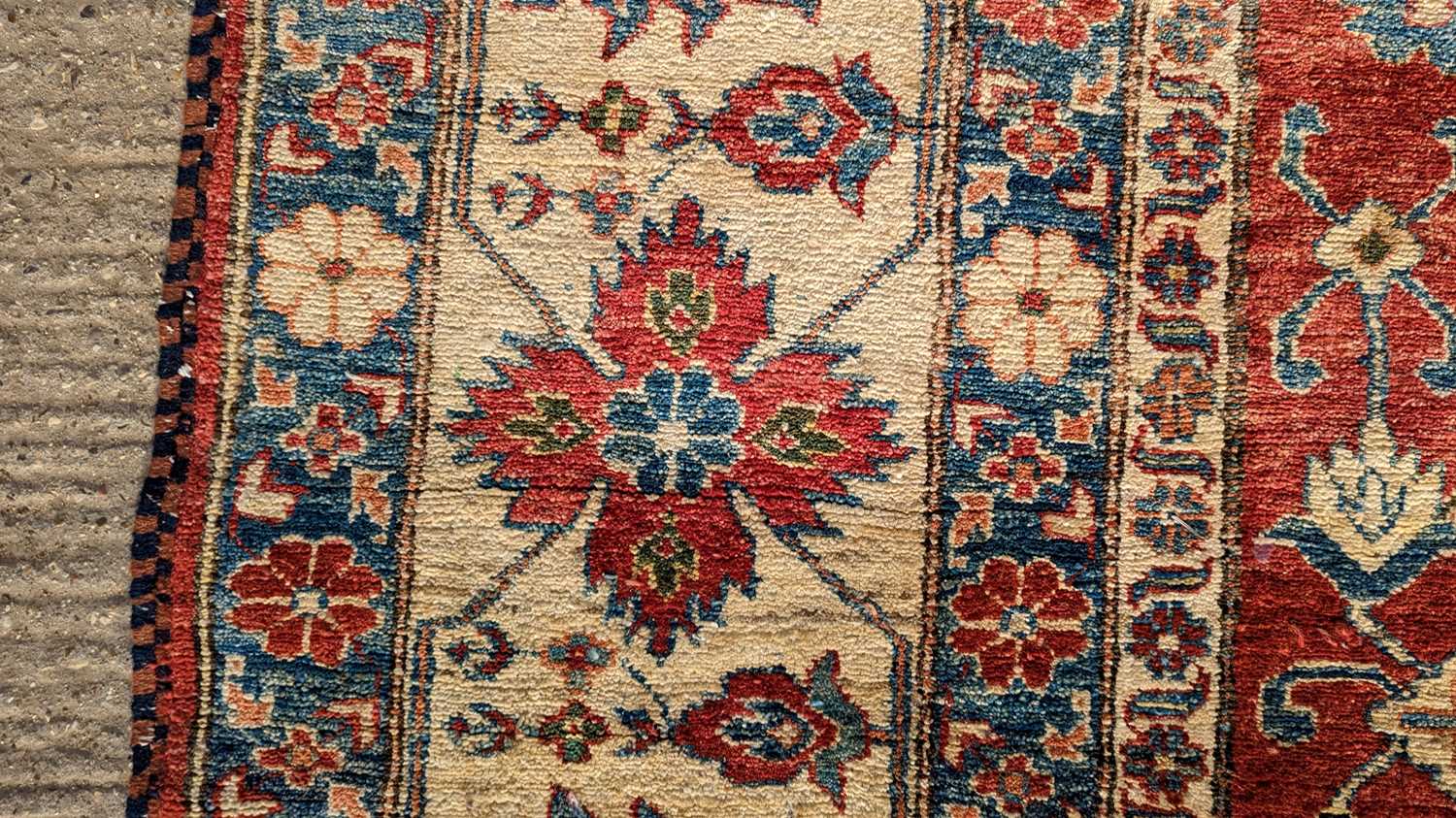 A Kazak carpet - Image 16 of 17