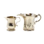 Two silver cream jugs,