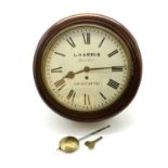 A mahogany wall clock,