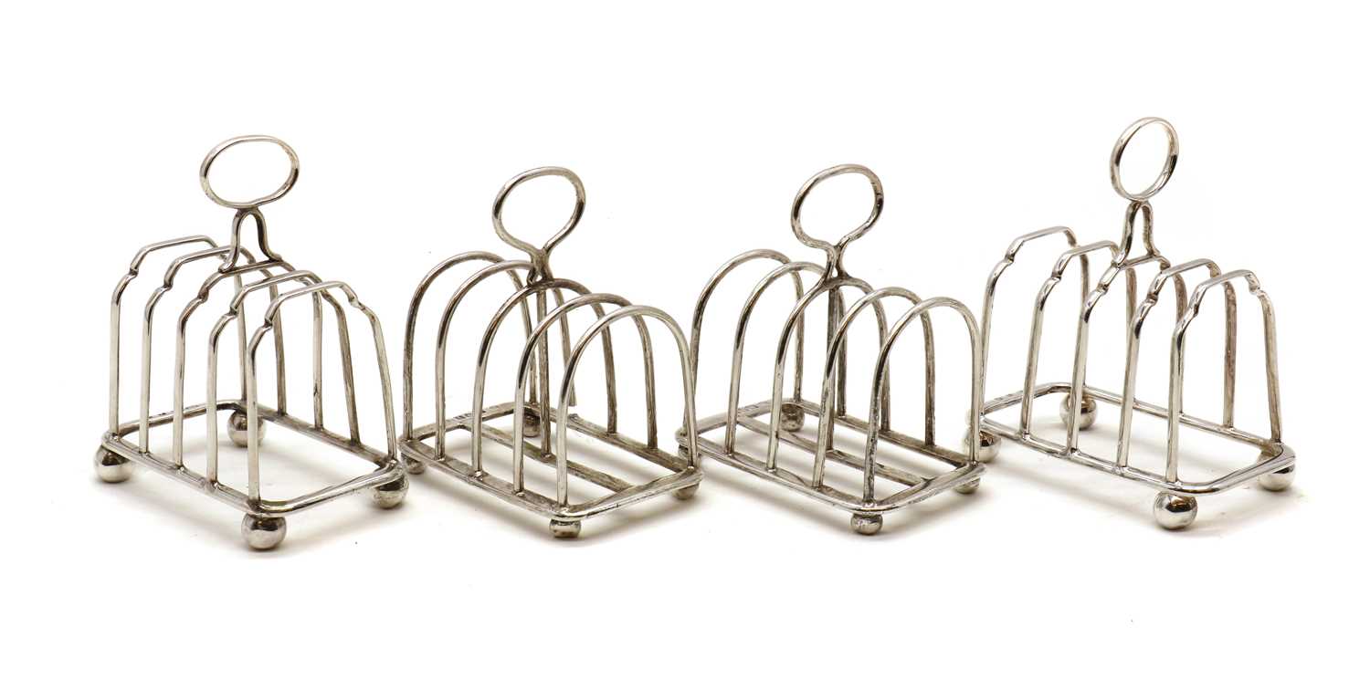 A Victorian silver four division toast rack,