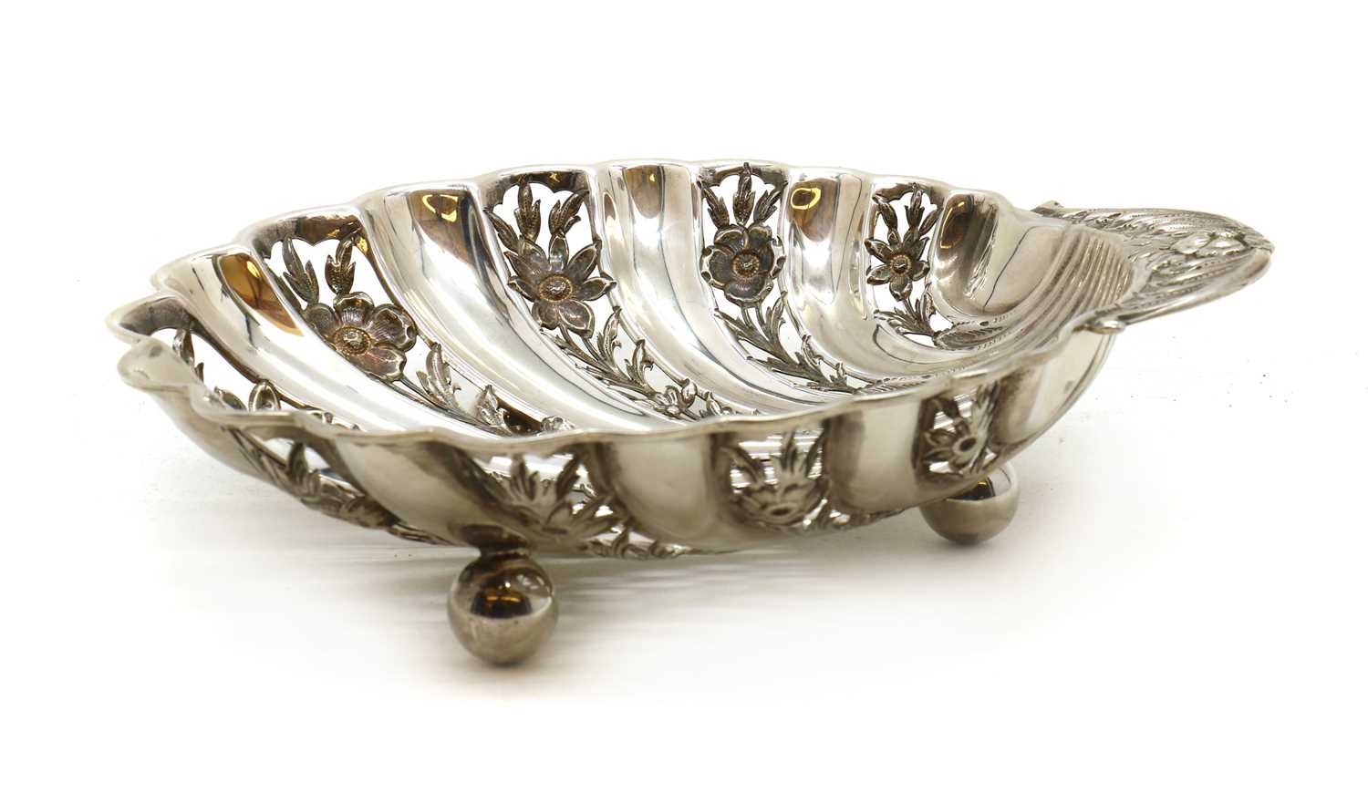 A silver shell dish,