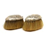 A pair of Dutch silver mounted brushes,