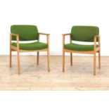 A pair of Danish oak armchairs,