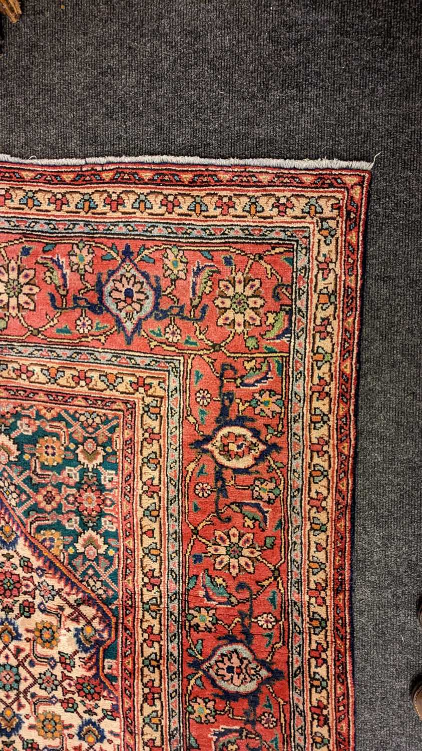 A Tabriz carpet - Image 12 of 21