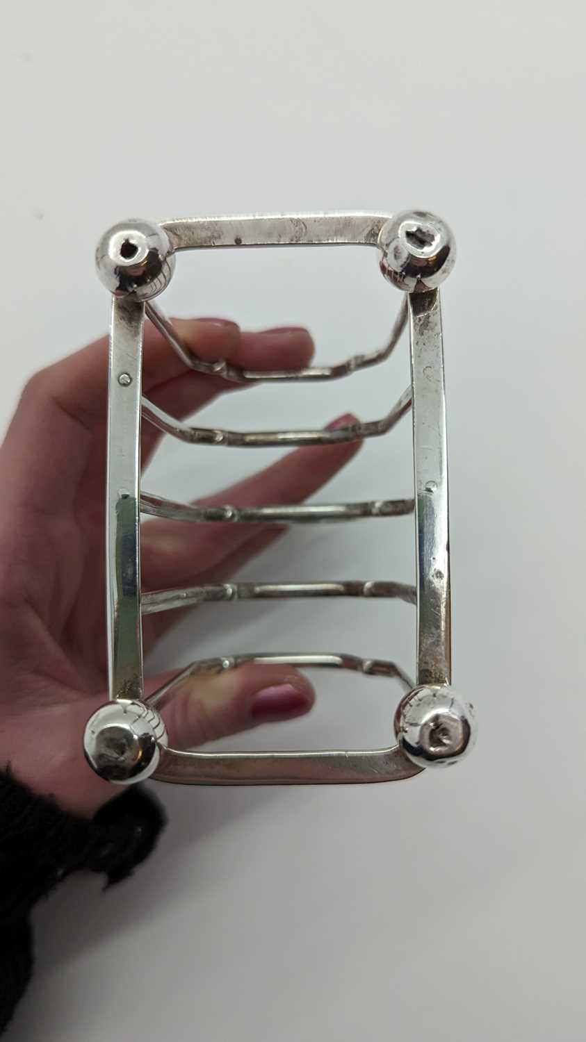 A Victorian silver four division toast rack, - Image 8 of 18