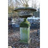 A composition stoneware garden urn,