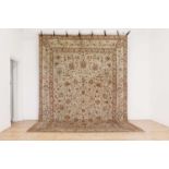 A large Kashan carpet,