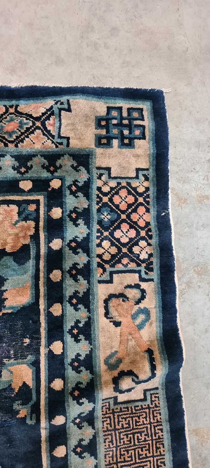 A Chinese wool rug, - Image 6 of 24