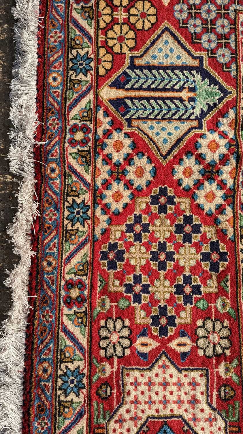 A Tabriz carpet - Image 11 of 24