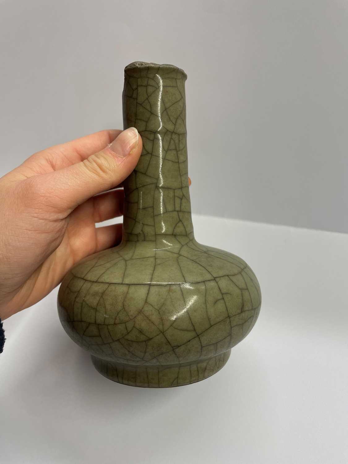 A Chinese celadon glazed bottle vase, - Image 15 of 17