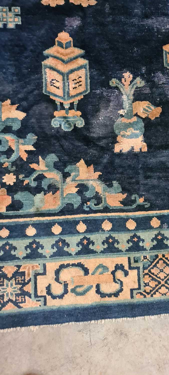 A Chinese wool rug, - Image 15 of 24