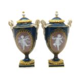 A pair of Meissen porcelain urns,