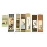 A collection of seven Chinese and Japanese hanging scrolls,