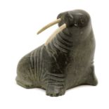 An Inuit argillite carving,