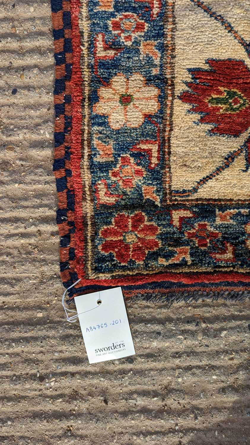 A Kazak carpet - Image 15 of 17