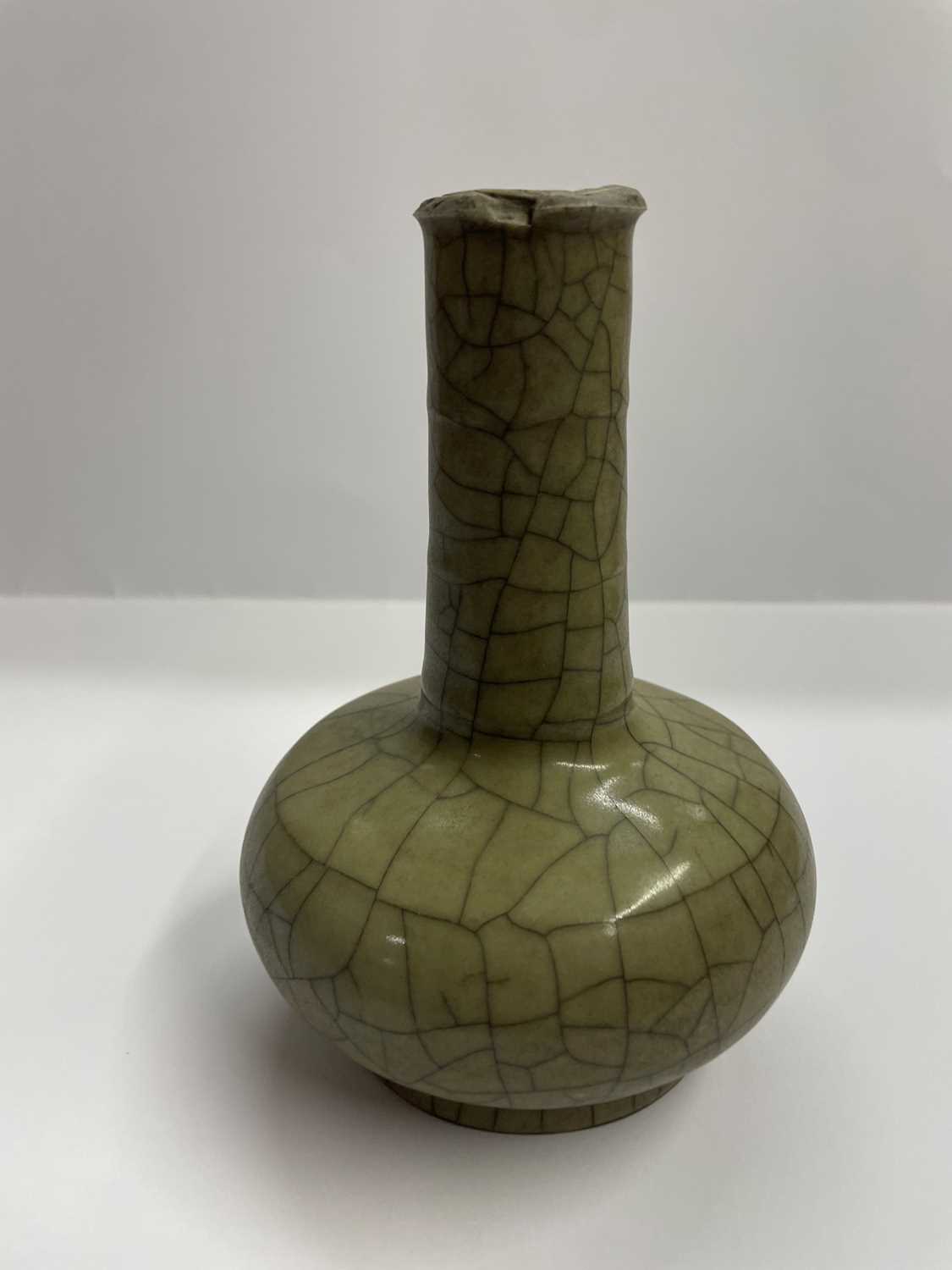 A Chinese celadon glazed bottle vase, - Image 13 of 17