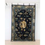 A Chinese wool rug,