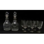 A pair of Regency cut glass decanters,