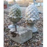 A pair of Haddonstone pineapple pillar finials,