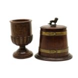 A carved mahogany chalice,