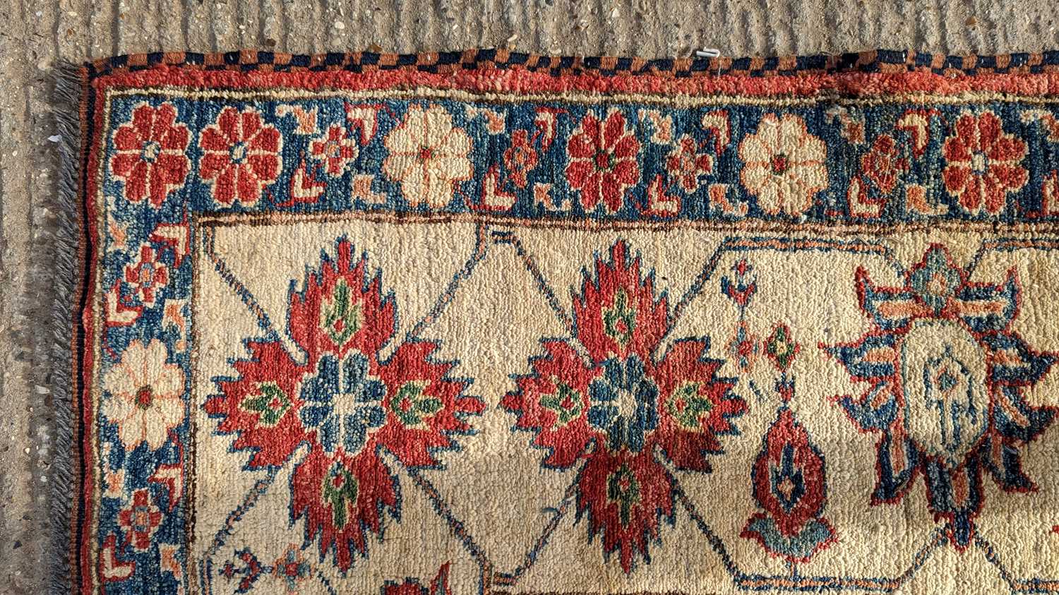 A Kazak carpet - Image 9 of 17