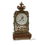 A French brass and rouge marble mantel clock