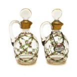 A pair of painted glass dressing table bottles and stoppers,