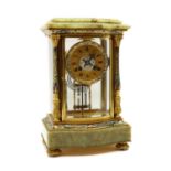 A French Champlevé enamel and onyx mantel clock