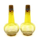 A pair of Ludwig Moser vaseline glass vases,
