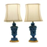 A pair of pottery table lamps,