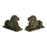 A pair of reconstituted stone lion figures,