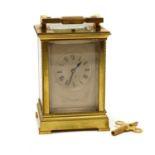 A brass cased carriage clock