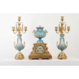 A gilt-bronze and Sèvres-style porcelain clock garniture,