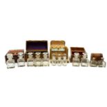 A collection of five cased travelling scent bottles,