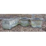 A pair of stone planters,