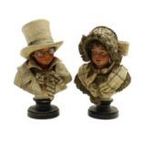 A pair of Austrian painted terracotta novelty busts of children,