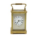 A brass carriage clock,
