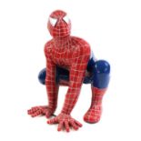 A fibreglass life size figure of Spiderman,