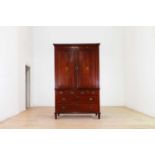 A George III mahogany and inlaid linen press,