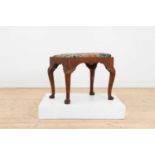 A George I walnut stool,