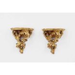 A pair of giltwood wall brackets,