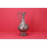 An Victorian Irish silver Armada pattern claret jug,