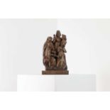 A carved walnut figure group,