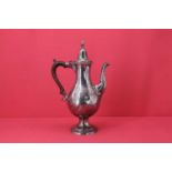 A George III silver coffee pot,