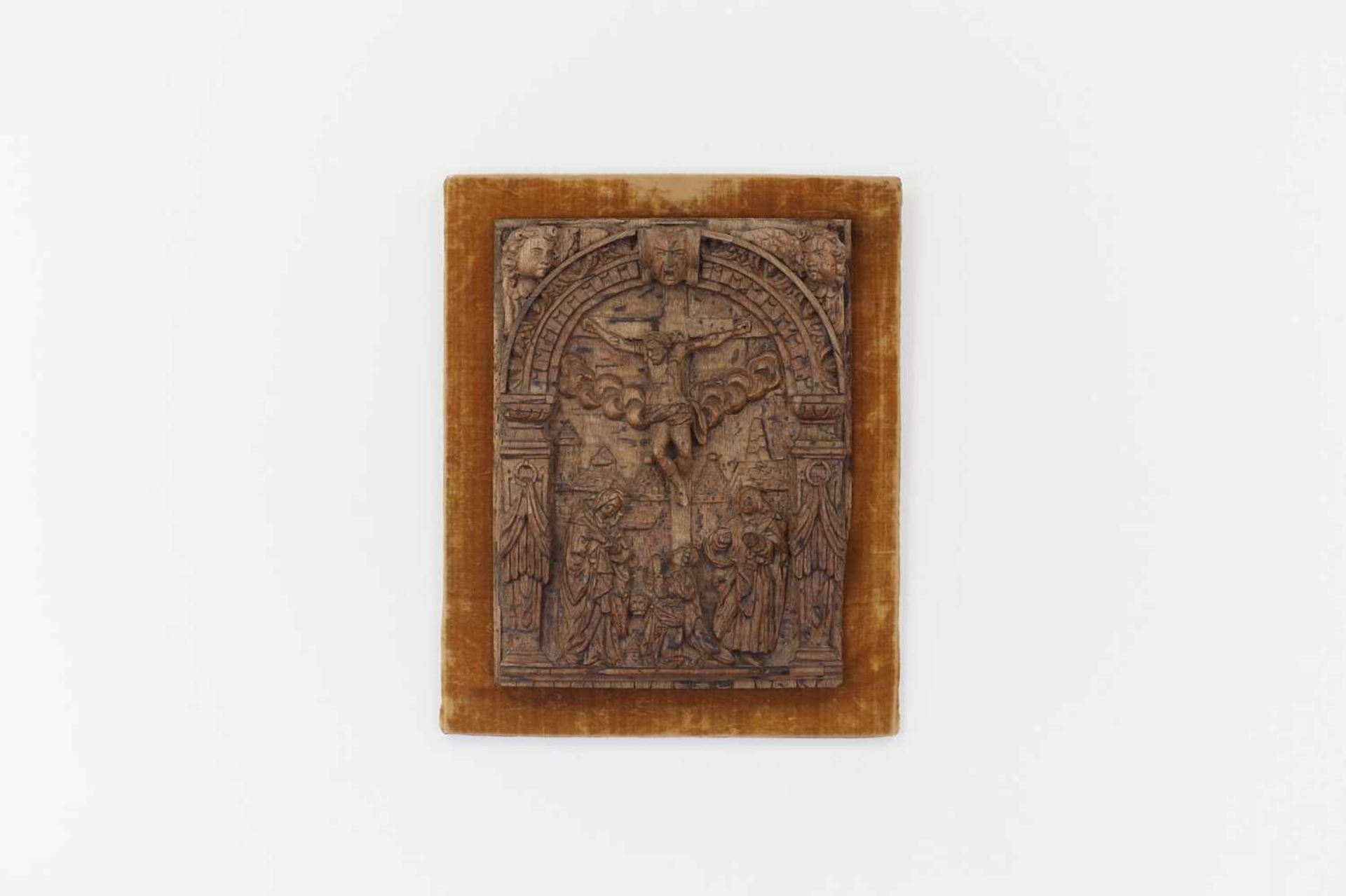 A carved oak relief panel,