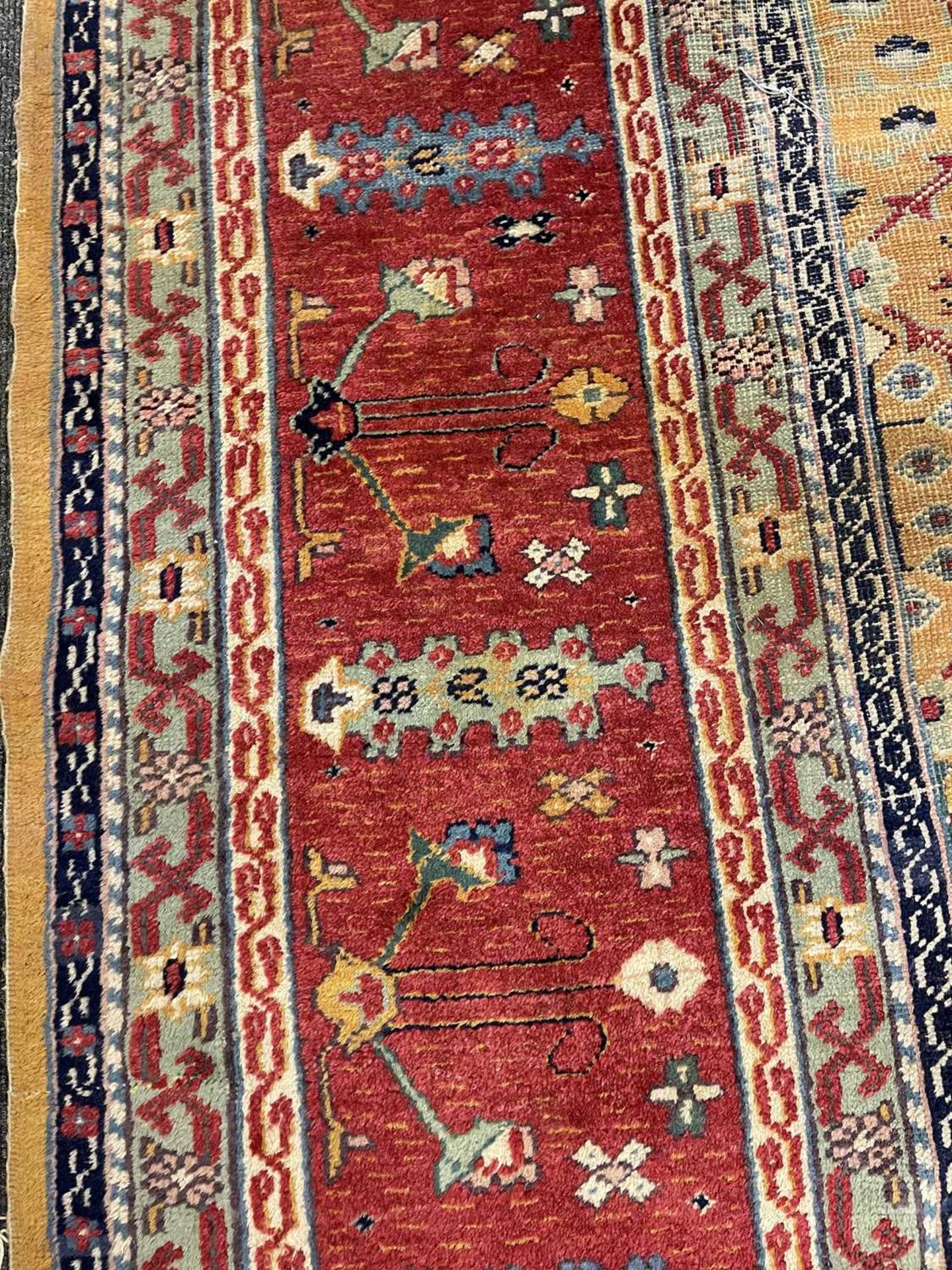 A Persian wool carpet, - Bild 23 aus 26