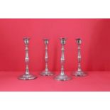 A set of four George IV silver candlesticks,