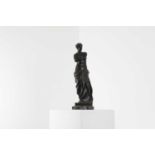 A bronze figure of the Venus de Milo,