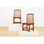 A pair of northern elm low chairs,